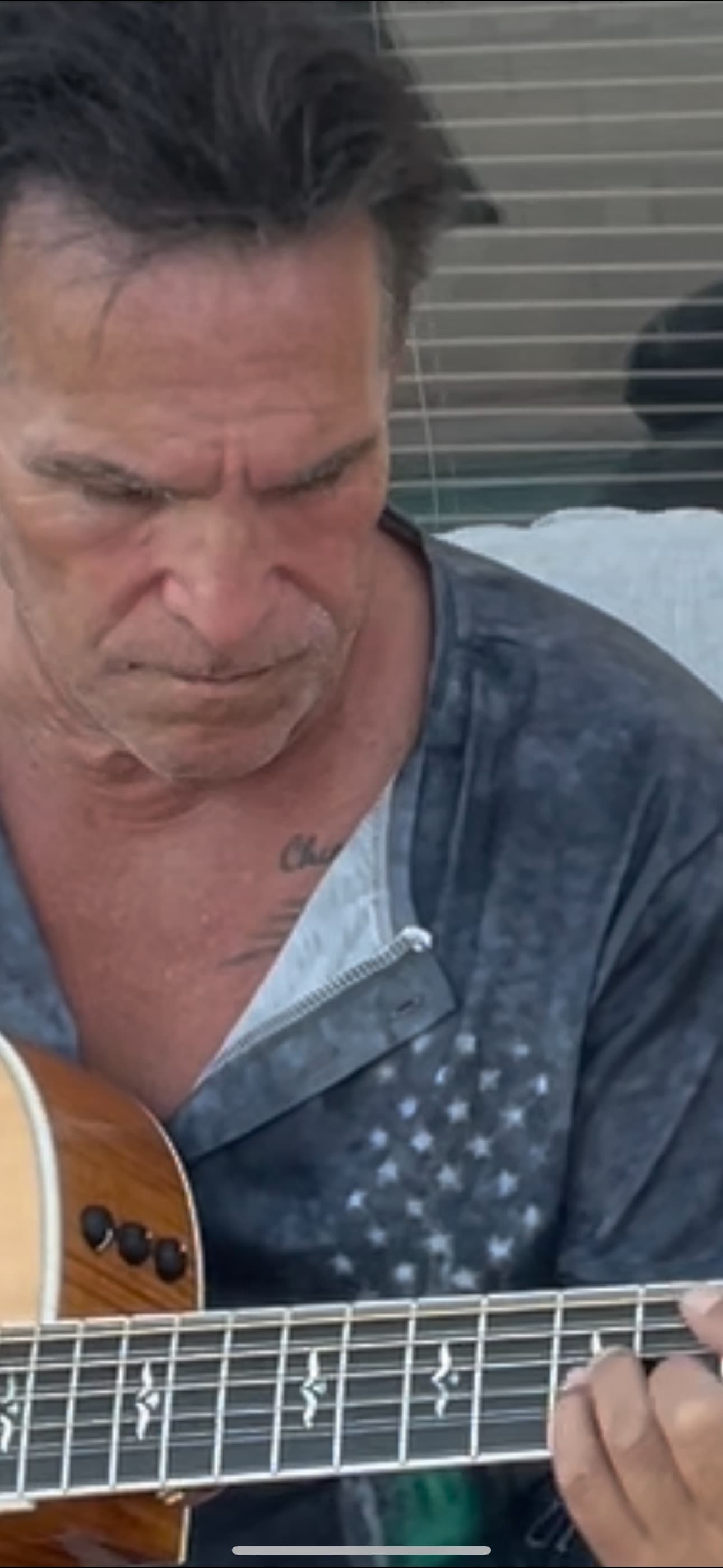 Mark Allen DiPietro close-up with guitar